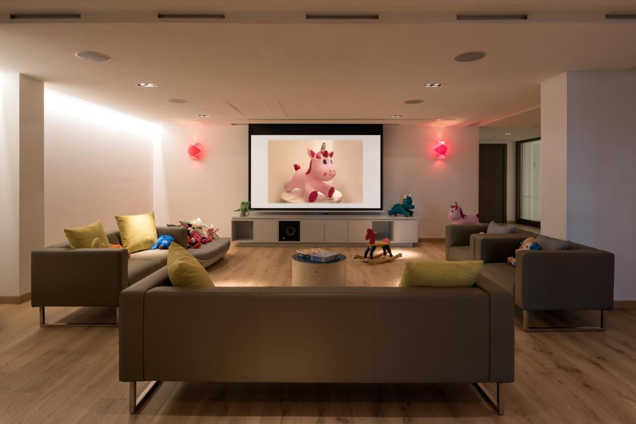 Amara - Sea Your Only View™ Limassol Luaran gambar A home theater